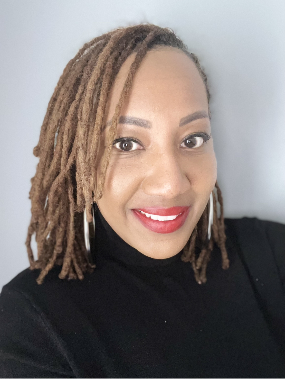 Professional portrait of Dijha Allen, Ed.M., college consultant and student-success advisor
